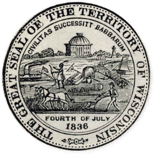 The official 1836 territorial seal features the figure of a white man breaking the land with a team and plow. He is surrounded by ships, lighthouses, and steamboats, symbols of a modern commercial economy. A large domed capitol building is above the farmer, and words encircle the seal: The Great Seal of the Territory of Wisconsin. Fourth of July 1836, Civilitas Successit Barbarum