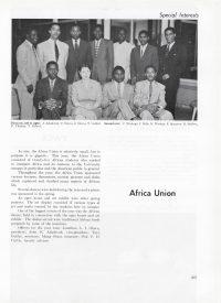 Africa Union members seated in a classroom for a large group photo.
