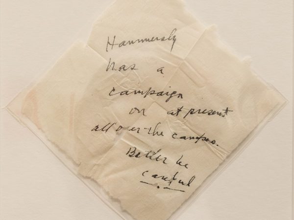 A square of toilet paper with handwritten note that says "Hammersly has a campaign on at present all over the campus. Better be careful." UW–Madison Archives.